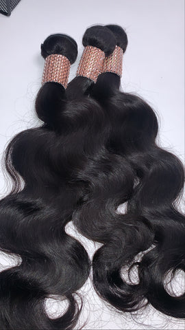 1 BUNDLE OF OUR RAW INDIAN HAIR EXTENSIONS